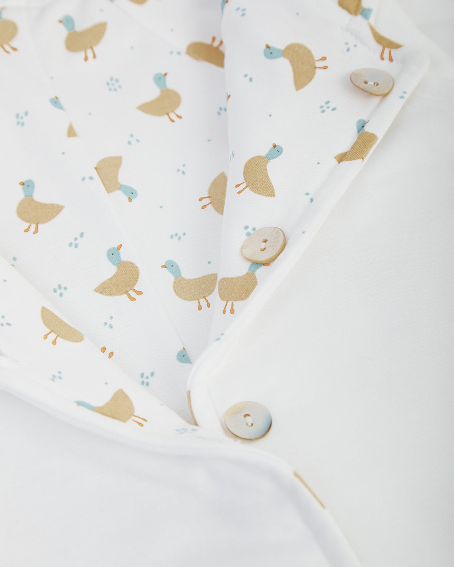 Buzo Reversible Blanco/Patos