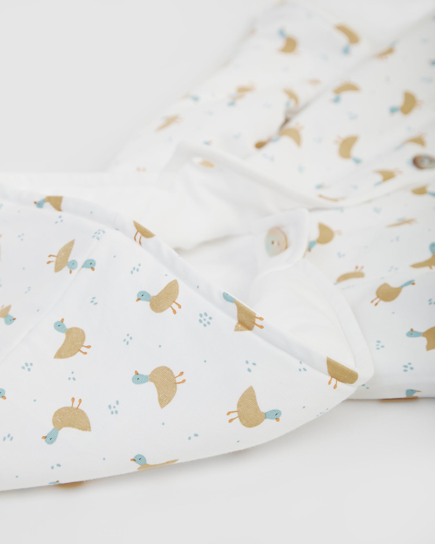 Buzo Reversible Blanco/Patos