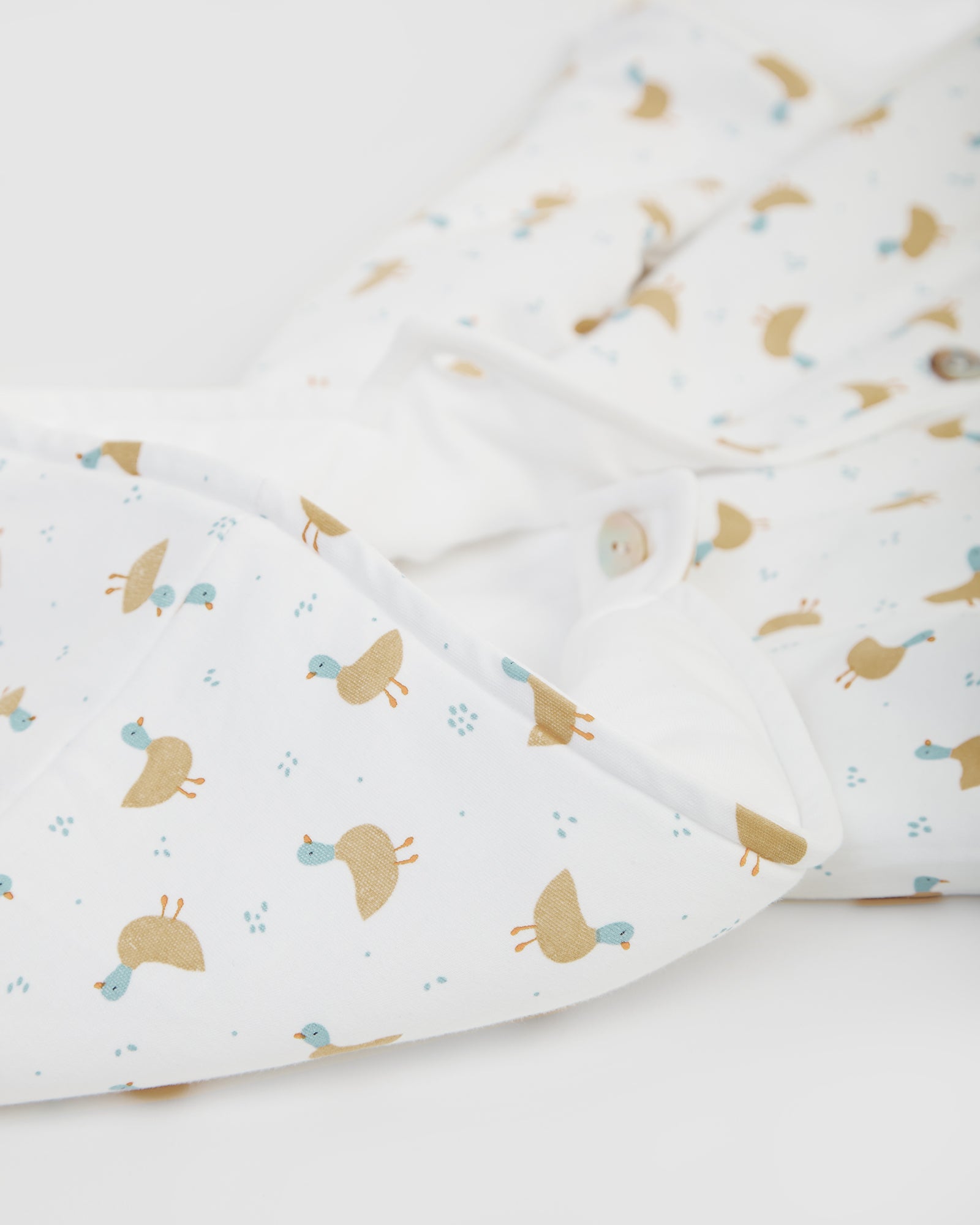 Buzo Reversible Blanco/Patos