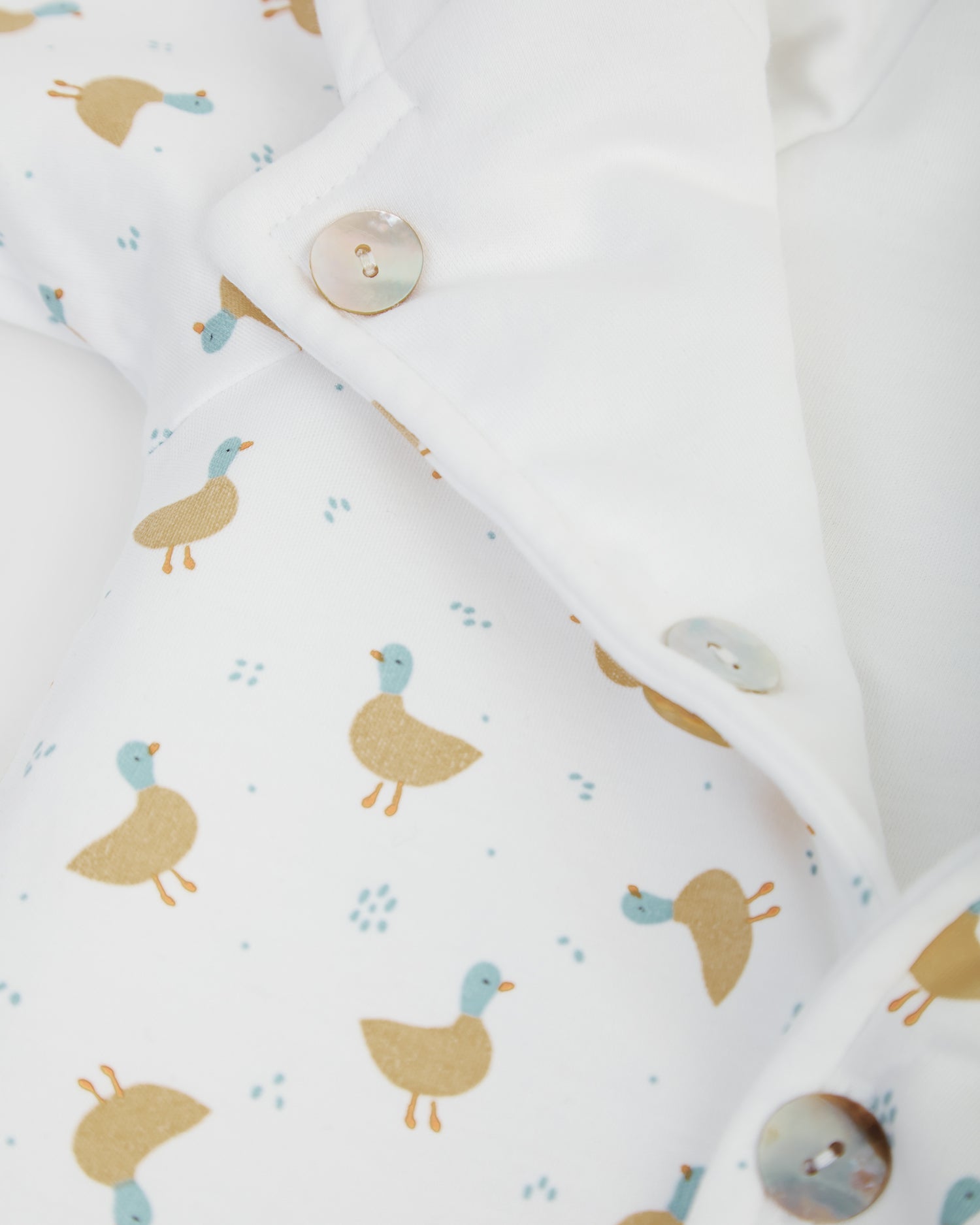 Buzo Reversible Blanco/Patos