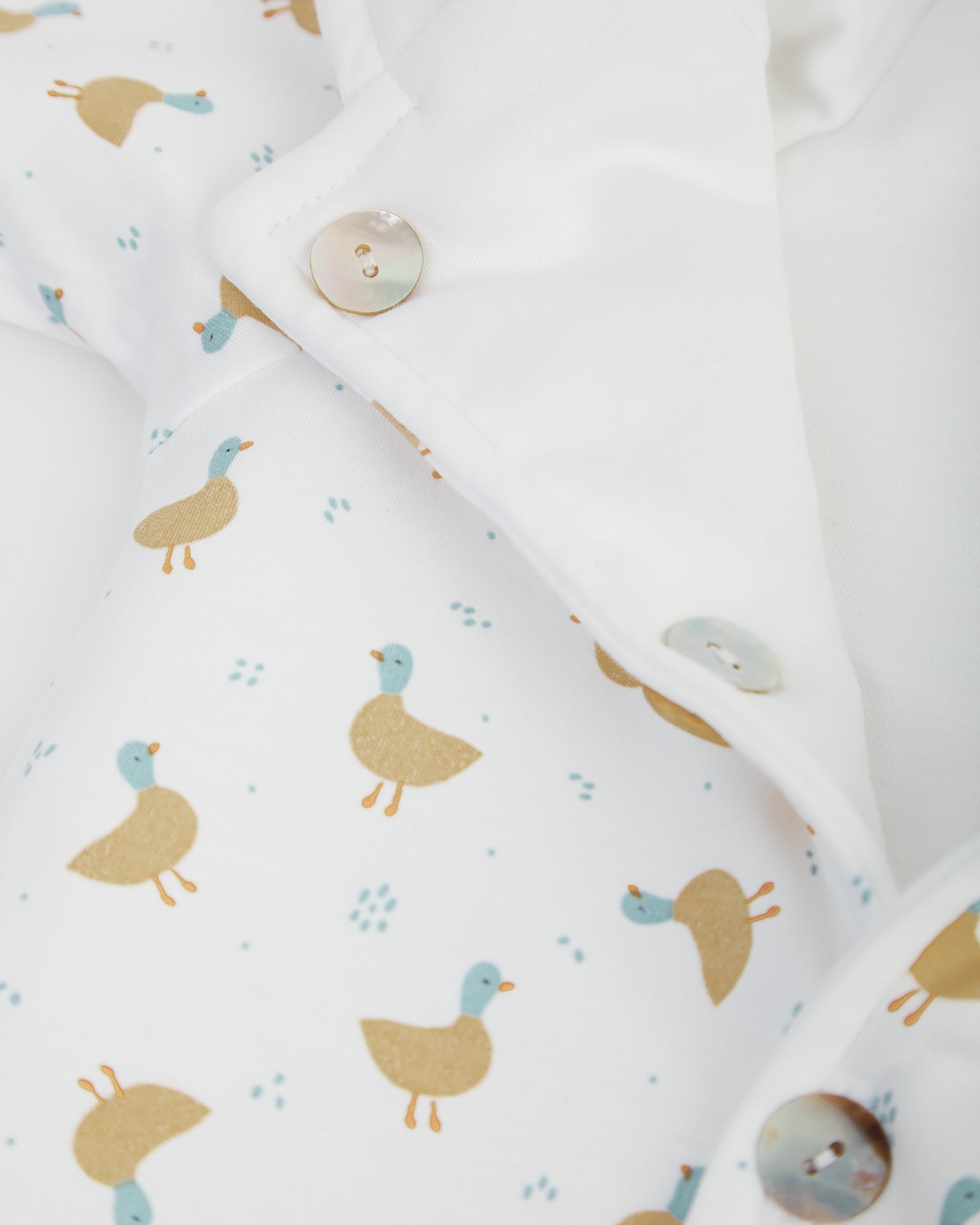 Buzo Reversible Blanco/Patos